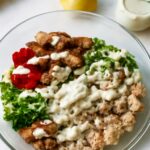 A comparison of seaweed salad, papaya salad, and grilled chicken Caesar salad calories